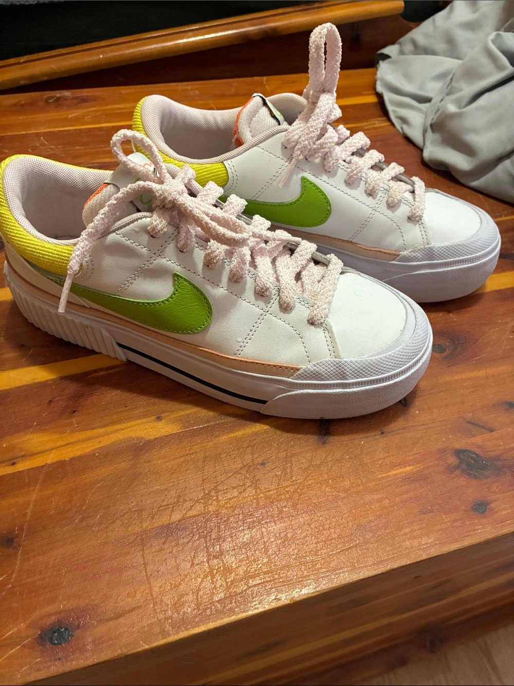Nike women’s White Sneakers with Lime Swoosh and Pink Laces